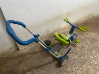 Triciclo infantil con manillar y asiento