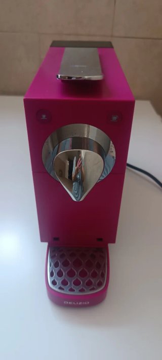 Cafetera de cápsulas rosa