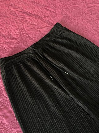 Pantaloni neri plissettati