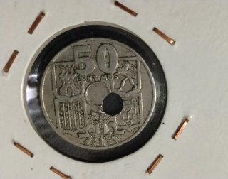 50 céntimos España 1949 error agujero