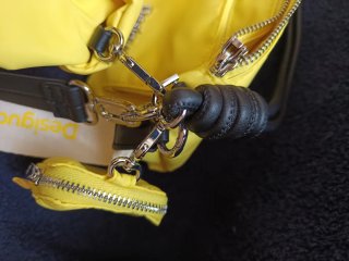 Bolso Desigual amarillo multibolsillos