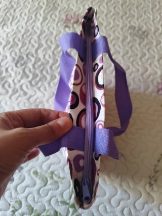 Bolso de mano con círculos