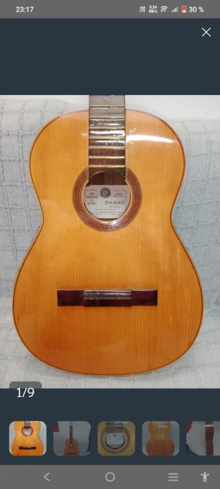 Guitarra casa damas
