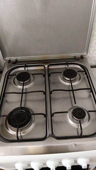 Cocina de gas 4 fuegos con horno