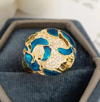Anello dorato smalto blu zirconi
