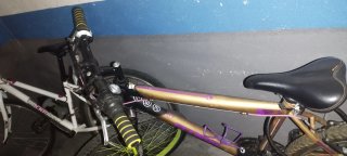 Bicicleta Montaña Dorada y Morada