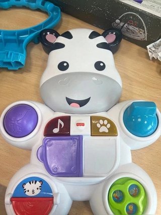Fisher-Price Cebra parlanchina primeros pasos,