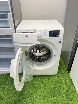 Nevera Grundig y Lavadora AEG garantía trasporte