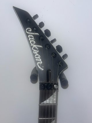 Guitarra Zurdos Jackson rojo cereza