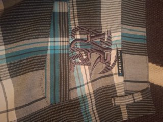 Pantalón corto Rip Curl Talla 34,nuevo prácticamen