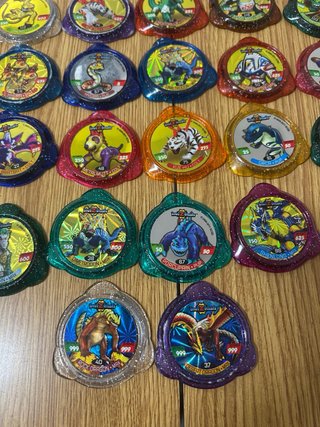 Lote de tazos invizimals