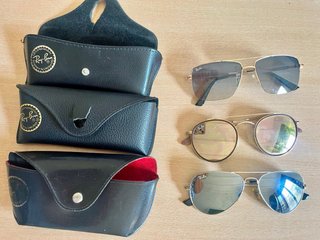 Gafas de sol Ray-Ban doradas y plateadas