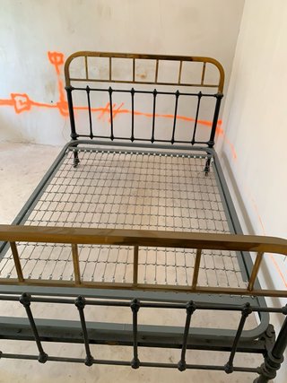 Cama de hierro forjado vintage