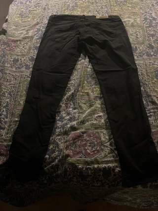 Pantalones vaqueros negros con cremallera