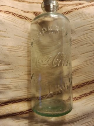 Botella Coca-Cola Property Of.Tiene más de 99 años