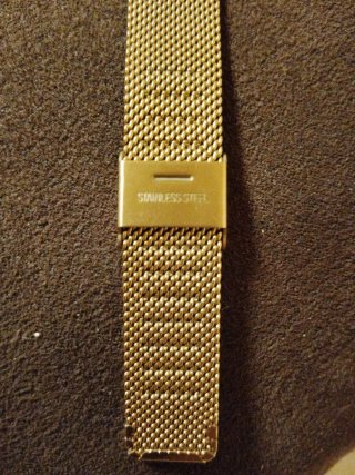Reloj Guess Triángulo Dorado