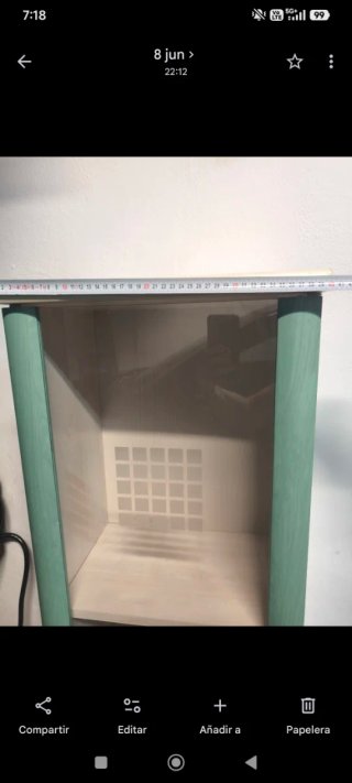 Armario vitrina cristal y madera.