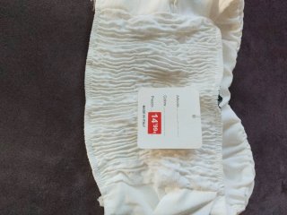 Top bianco con volants