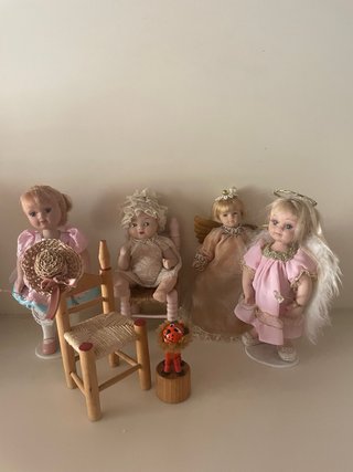 Piccole bambole vintage e accessori