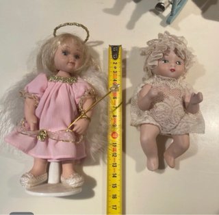 Piccole bambole vintage e accessori