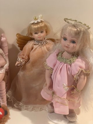 Piccole bambole vintage e accessori