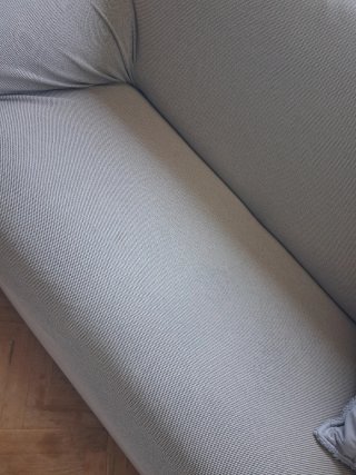 Sofá de piel beige