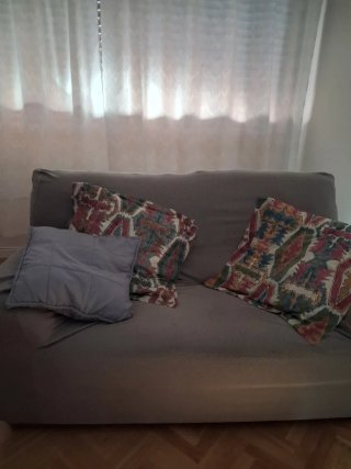Sofá de piel beige