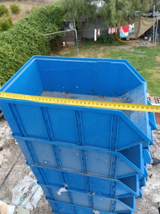 Cajas de plástico apilables azules