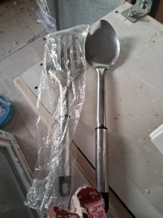 Cucharón y tenedor de acero inoxidable
