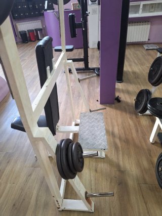 Press Profesional Hombros con barra y discos