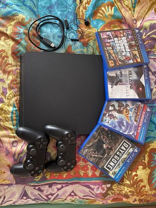 PS4 + 5 Juegos + 2 Mandos + Accesorios