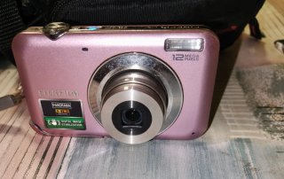 Cámara de fotos digital rosa Con su cargador