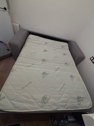 Sofá cama gris tela