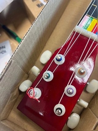 Guitarra para niños - Marca New Classic Toys
