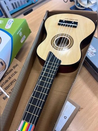 Guitarra para niños - Marca New Classic Toys