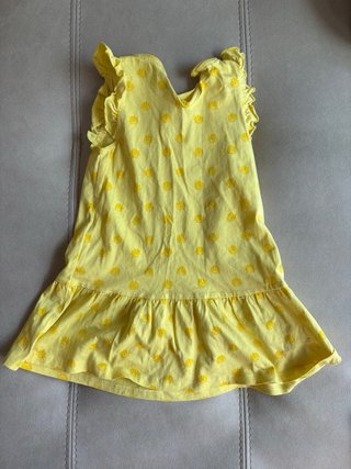 Vestido amarillo conchas niña
