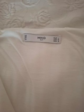 Vestido de punto blanco de Mango