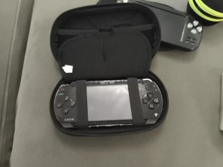 PSP 3000 Negra + 2 Juegos UMD