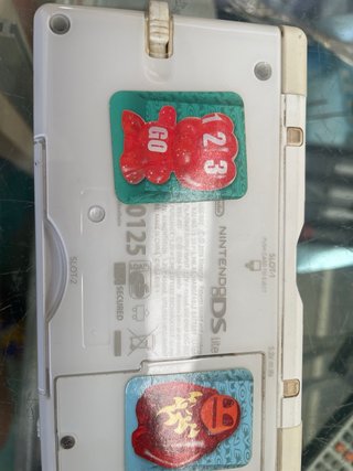 Nintendo DS Lite con pegatinas