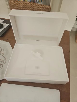MacBook Air con ratón Apple