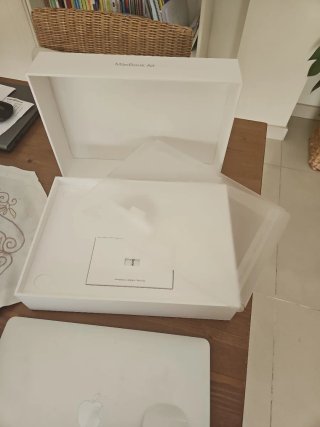 MacBook Air con ratón Apple