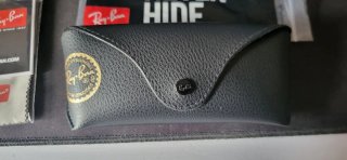 Gafas de sol Ray-Ban doradas y negras