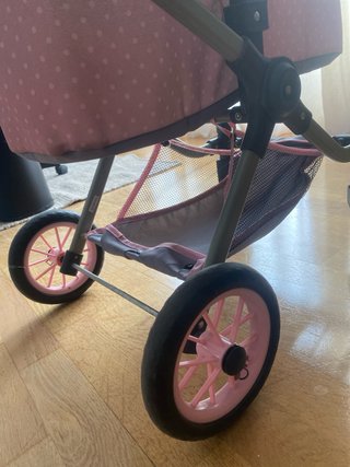 Carro de muñeca rosa lunares