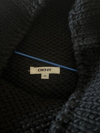 Chaleco negro cuello alto tejido