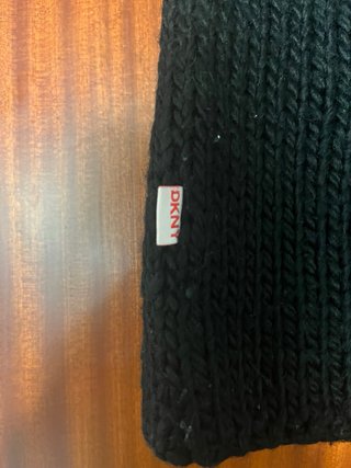 Chaleco negro cuello alto tejido