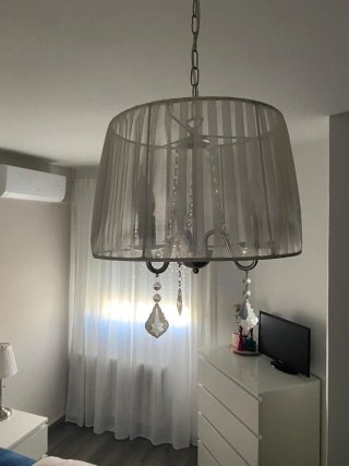 Lámpara de techo con velas de cristal