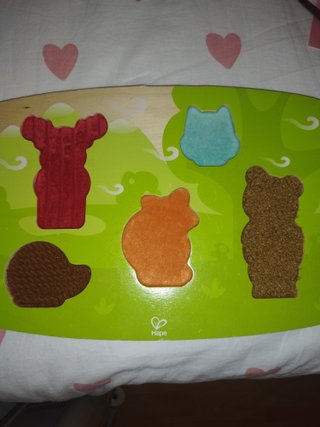 Puzzle madera animales Hape con texturas