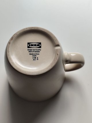 Taza beige crema Ikea con asa