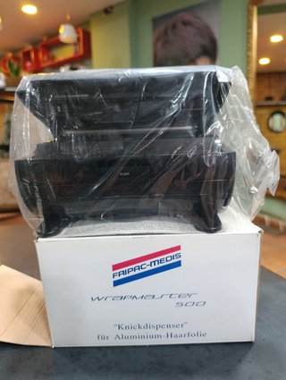 Dispensador papel aluminio peluquería