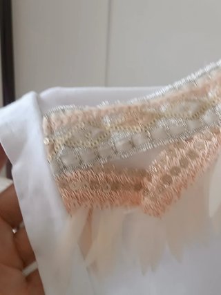Camiseta fantasía M lentejuelas y plumas